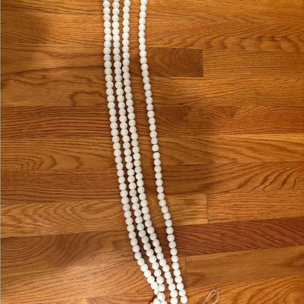 10ft white wood bead garland. No flaws, never used.